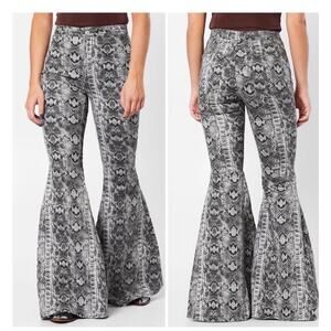 We The Free People Snakeskin Just Float On Print Flare Jeans 25